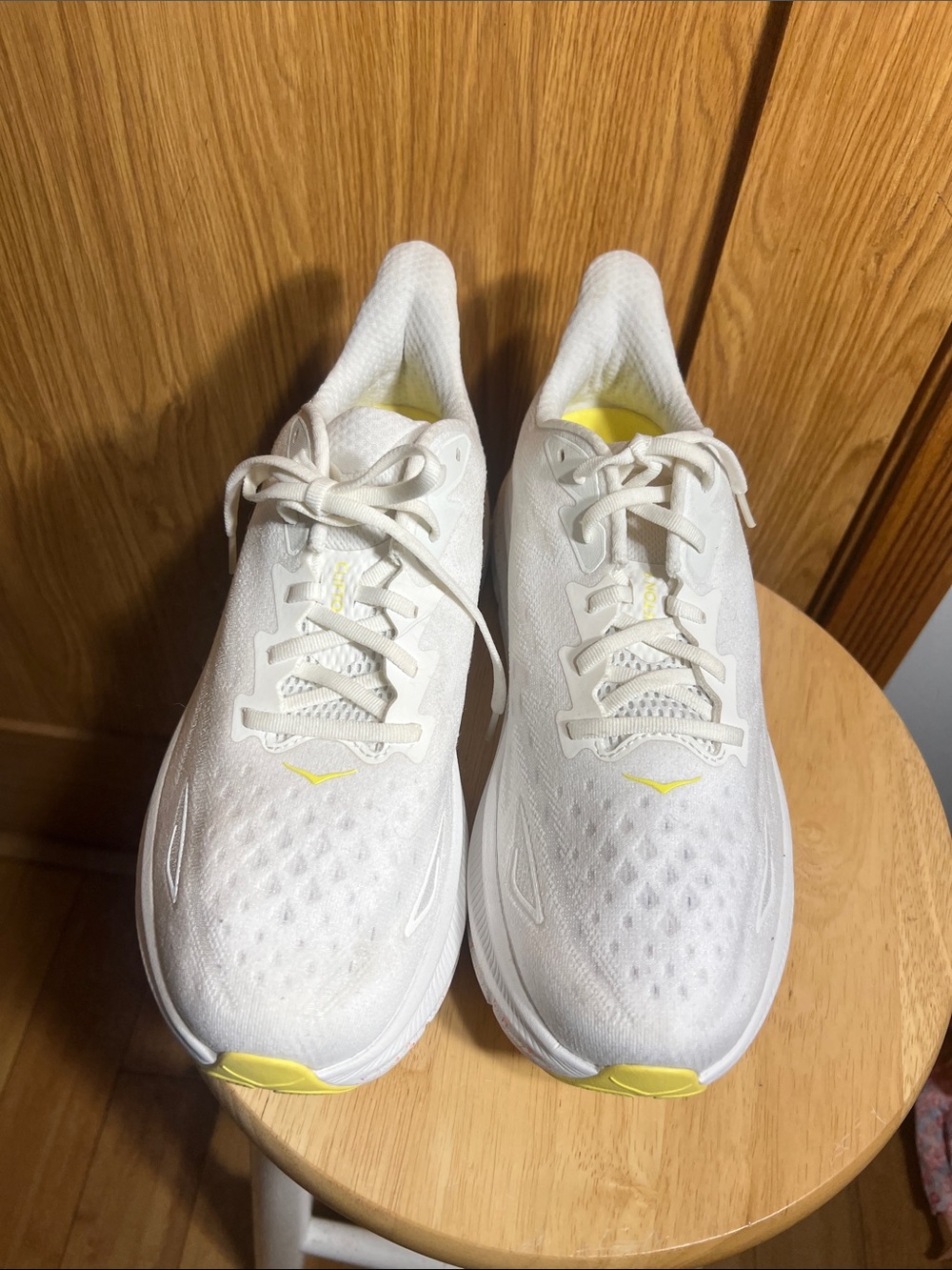 Hoka White Athletic Shoes with Yellow Accents